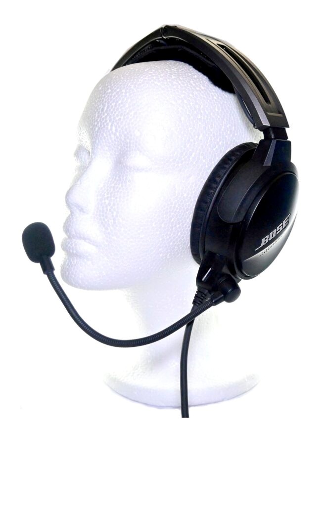 Bose over-ear headset with boom microphone on a white background.